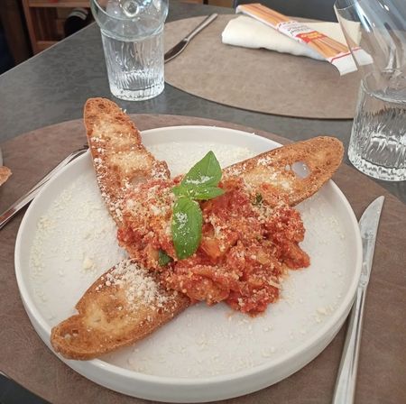 Specialità rustica siciliana servita alla Trattoria Anima e Cori