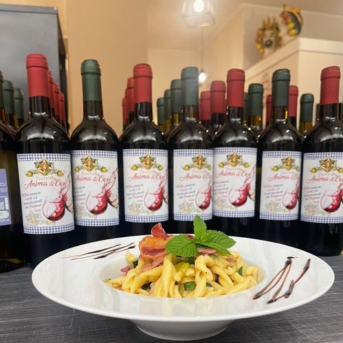 Selezione di vini rossi siciliani presso la Trattoria Anima e Cori a Barcellona Pozzo di Gotto